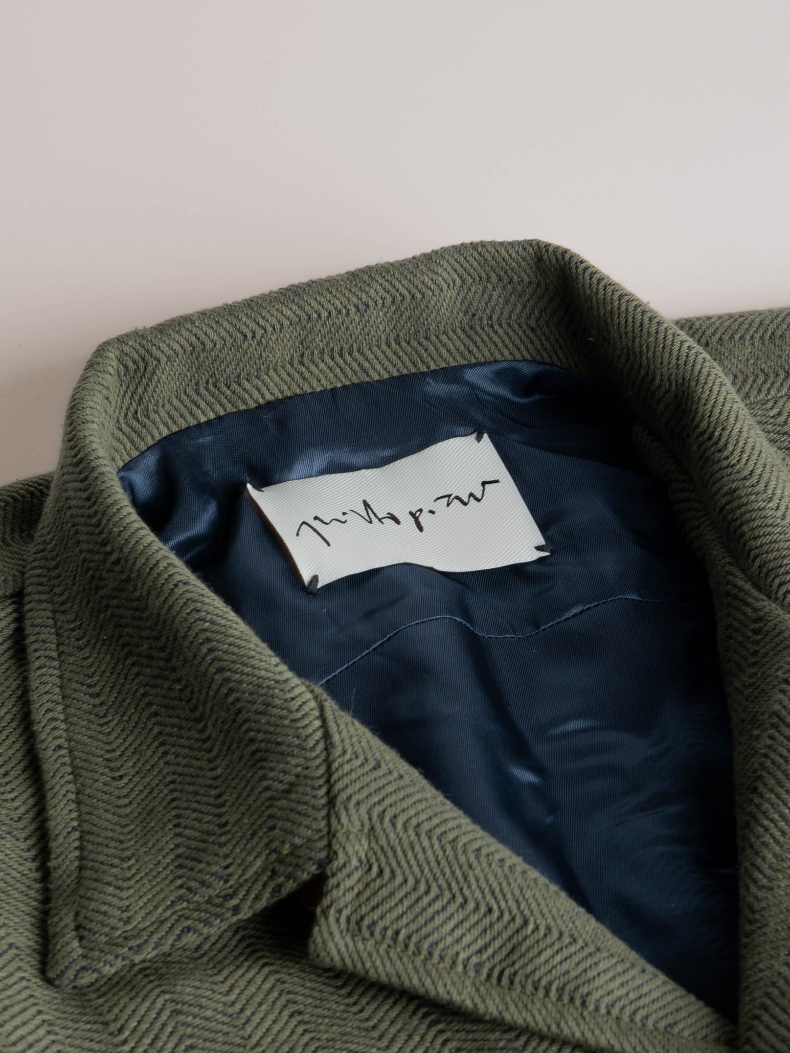 Packshot-BOMBERJACKET-GREENANDBLUE-100_COTTON-HANDWOVEN-HERRINGBONE-COLLAR