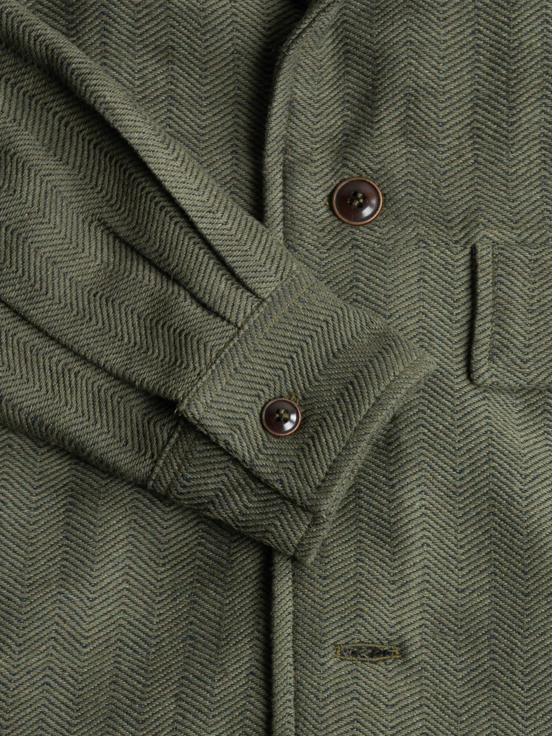 Packshot-BOMBERJACKET-GREENANDBLUE-100_COTTON-HANDWOVEN-HERRINGBONE-CUFF