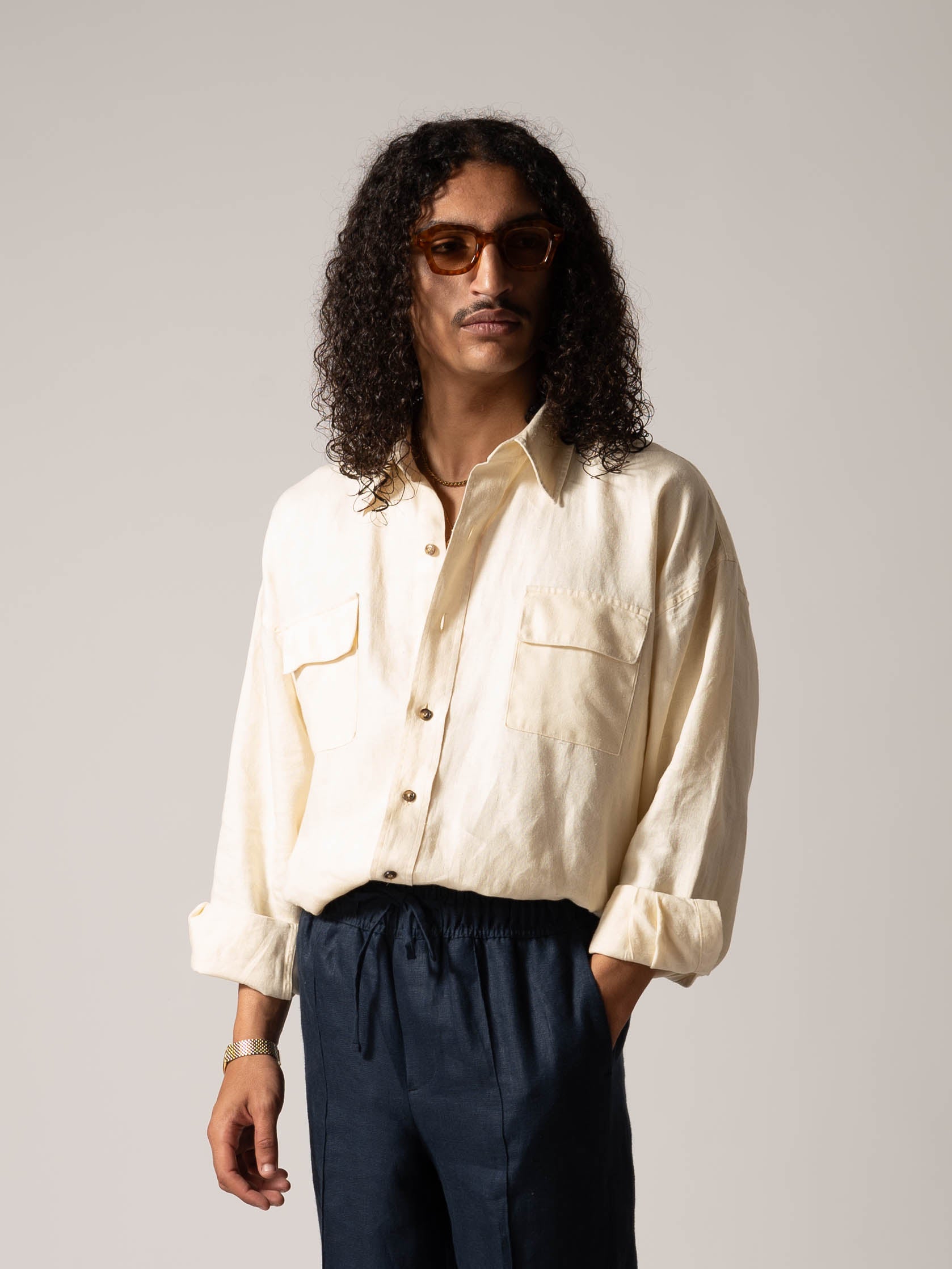 MODEL WEARING IVORY SHIRT - 100%LINEN